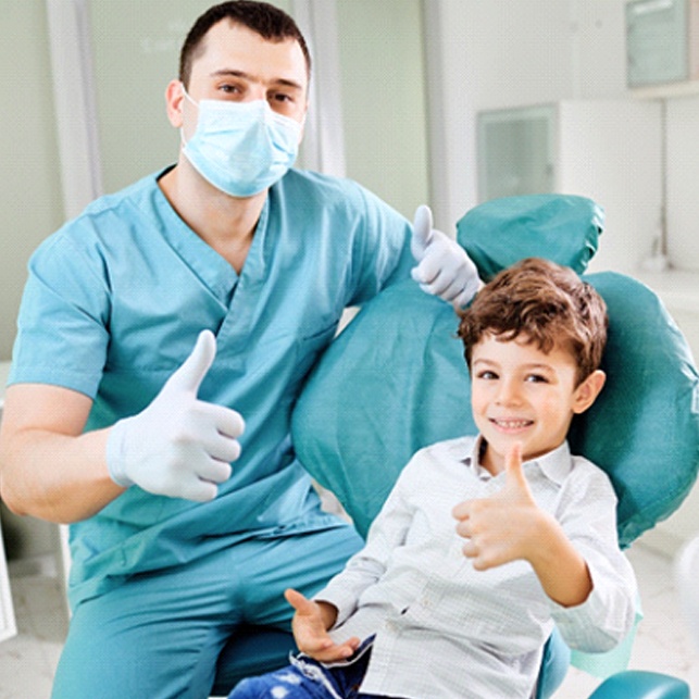 child smiling while visiting dentist in Chesterfield