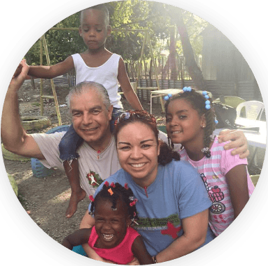 Doctor Sedighi with dental patients during community health event