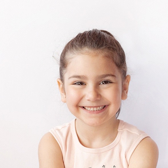 A little girl showing off her healthy smile in Chesterfield