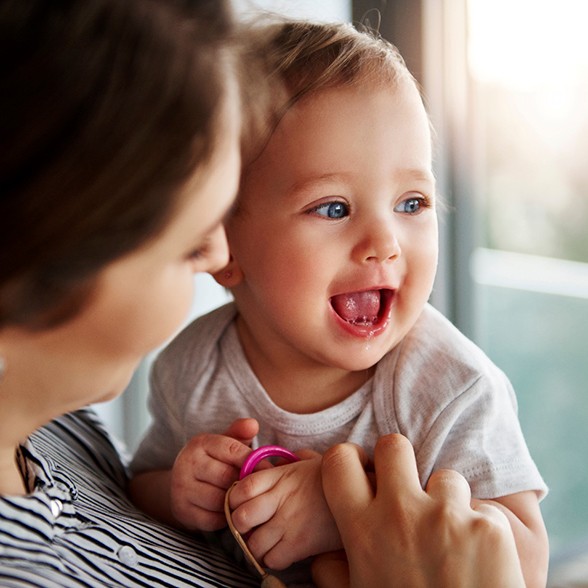 Mother and baby smiling