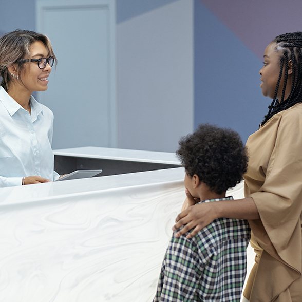 Receptionist at a desk