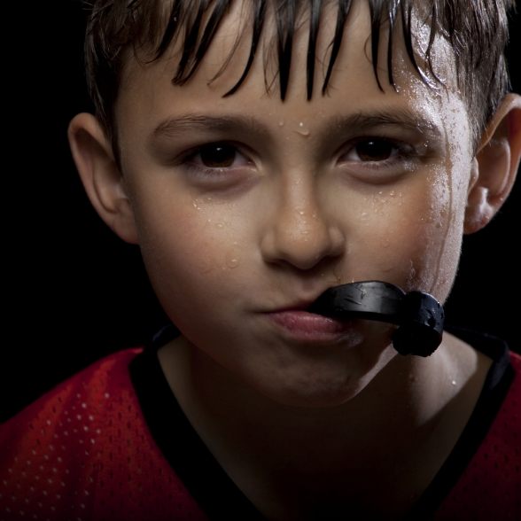 Preteen boy with an athletic mouthguard