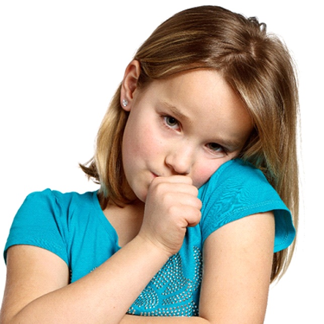 A little girl wearing a teal shirt sucks her thumb before going to see a pediatric dentist in St. Louis