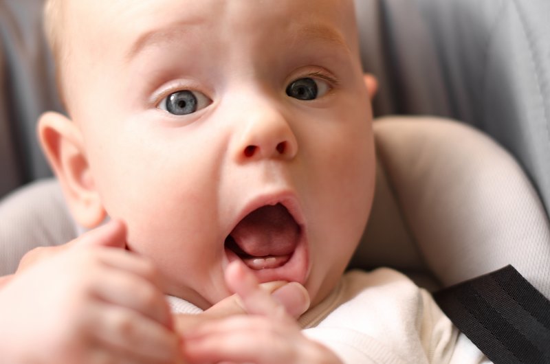 baby showing teeth