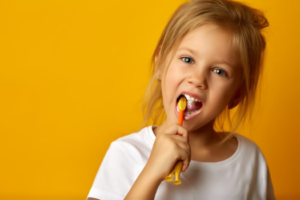 a child brushing their teeth