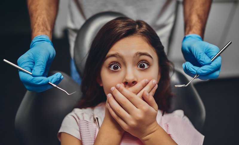 A child fearful of getting dental care