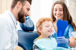 Child and parent at dentist.